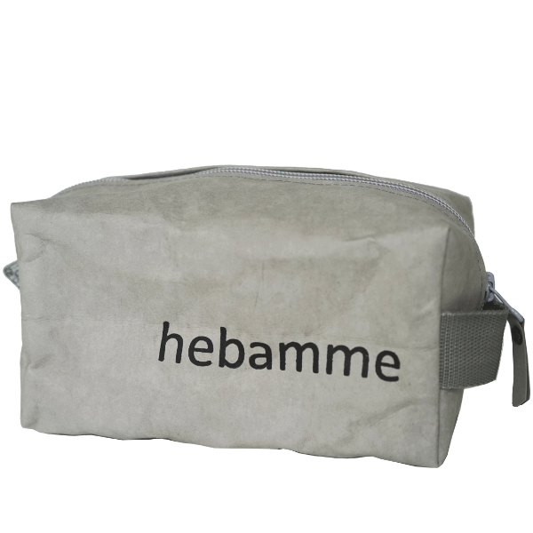 Graues Hebammentäschchen mit der Aufschrift "Hebamme".