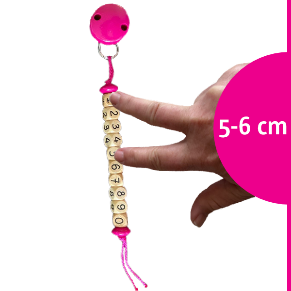 Muttermundperlen in pink mit einer Hand, die eine Muttermundweite von 5 bis 6 Zentimetern veranschaulicht.